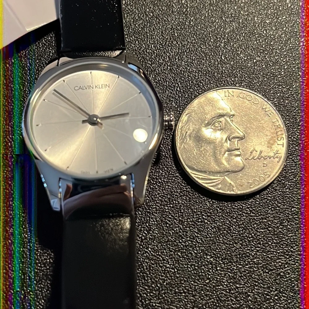 NWT Calvin Klein Swiss made women’s watch with black leather band
